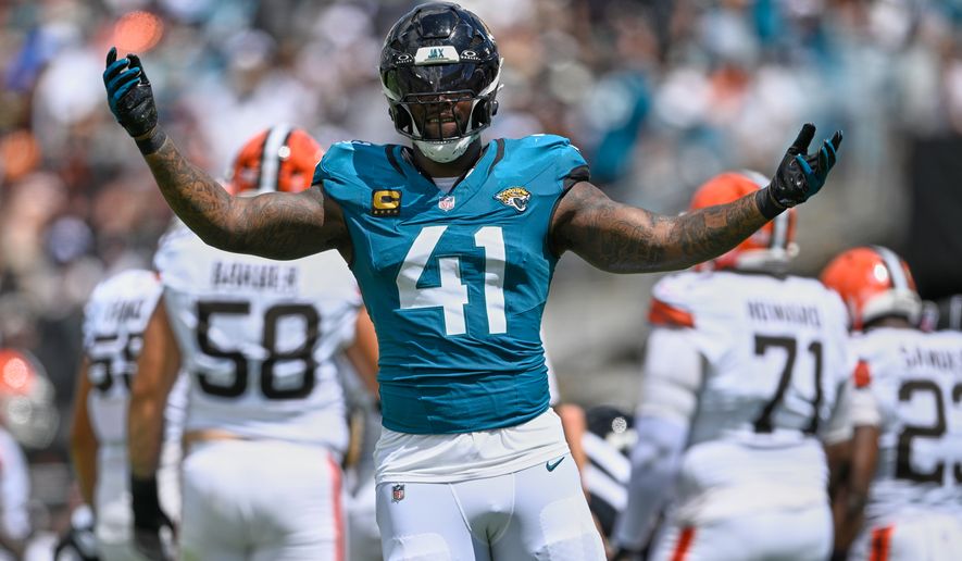Jacksonville Jaguars defensive end Josh Hines-Allen (41) celebrates after sacking Cleveland Browns quarterback Deshaun Watson in the first half of an NFL football game, Sunday, Sept. 13, 2026, in Jacksonville. (AP Photo/Phelan M. Ebenhack)