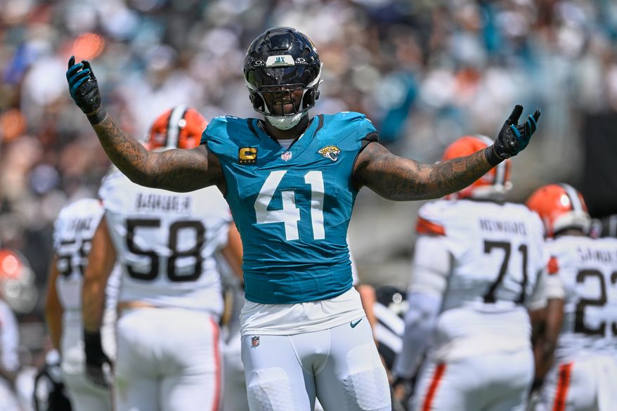 Jacksonville Jaguars defensive end Josh Hines-Allen (41) celebrates after sacking Cleveland Browns quarterback Deshaun Watson in the first half of an NFL football game, Sunday, Sept. 13, 2026, in Jacksonville. (AP Photo/Phelan M. Ebenhack)