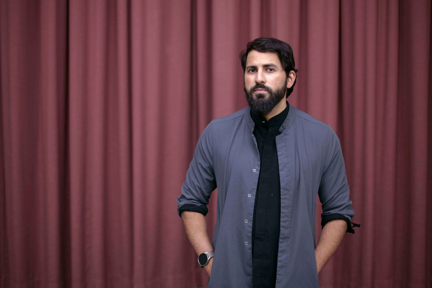 Muslim Chaplain Kaiser Aslam poses for a portrait at Rutgers University on Oct. 27, 2023, in New Brunswick, N.J. (AP Photo/Andres Kudacki, File)