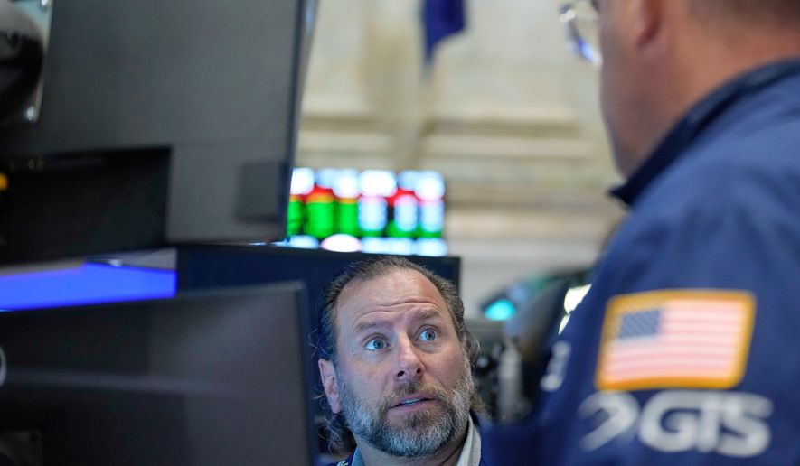 Michael Pistillo works on the floor at the New York Stock Exchange in New York, Monday, Sept. 14, 2026. (AP Photo/Seth Wenig)