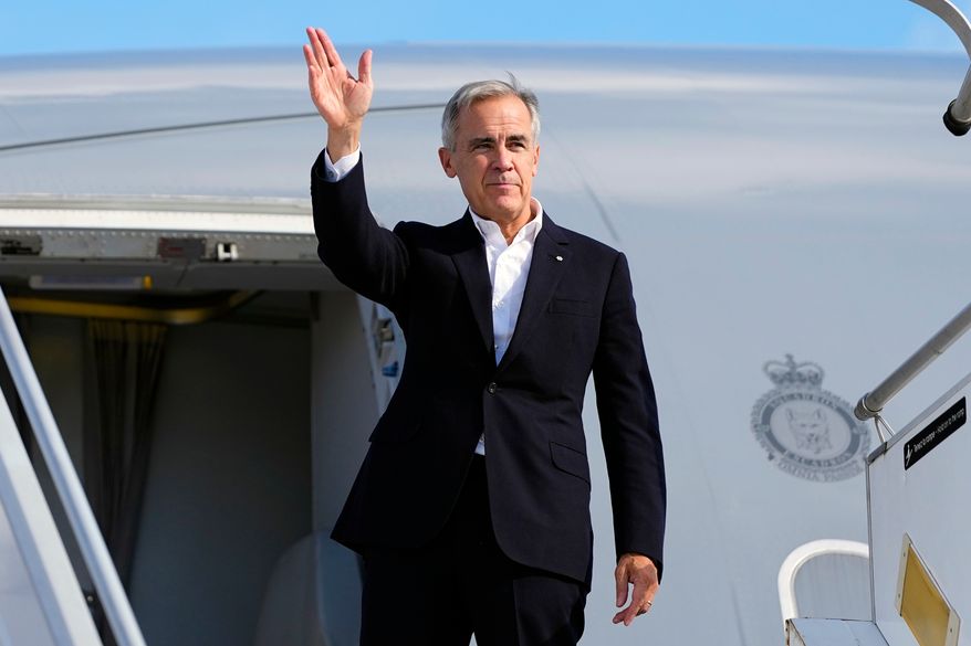 Canadian Prime Minister Mark Carney departs Strasbourg, France, en route to Liverpool, England, where he will meet with British Prime Minister Andy Burnham, France, Wednesday, Sept. 16, 2026. (Justin Tang/The Canadian Press via AP)
