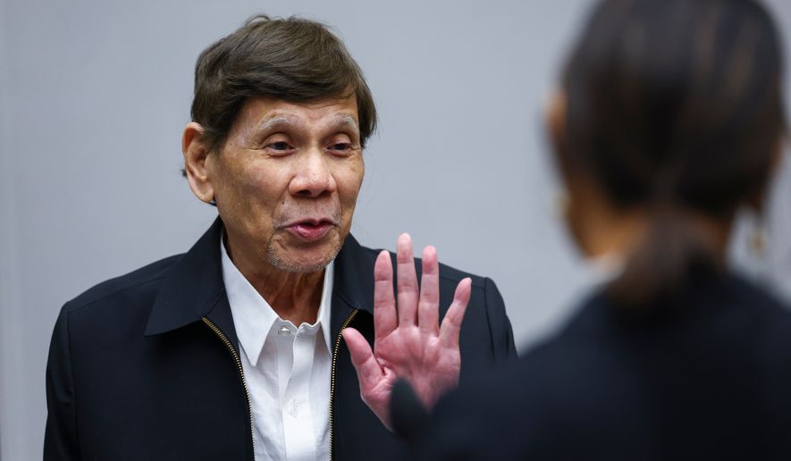 Former Philippine President Rodrigo Duterte appears before the International Criminal Court in The Hague, Netherlands, Wednesday, Sept. 16, 2026. (Piroschka van de Wouw/Pool Photo via AP)