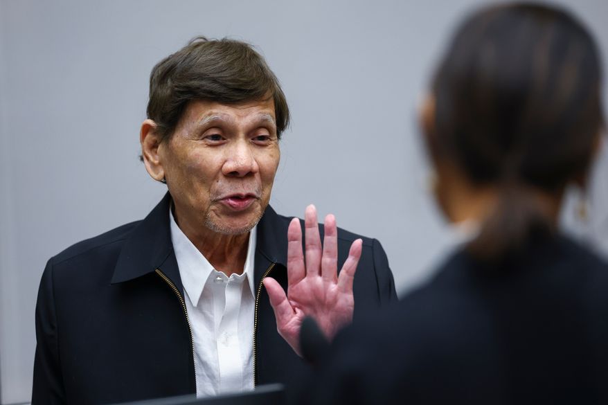 Former Philippine President Rodrigo Duterte appears before the International Criminal Court in The Hague, Netherlands, Wednesday, Sept. 16, 2026. (Piroschka van de Wouw/Pool Photo via AP)