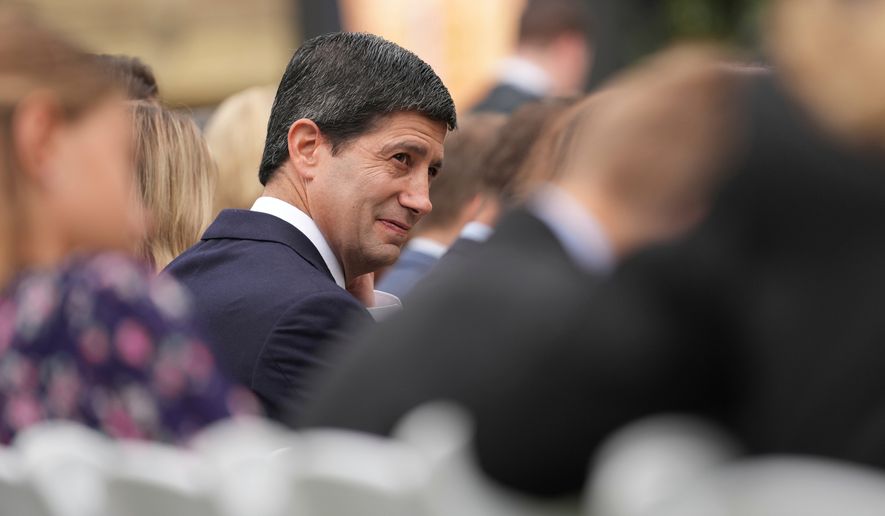 Federal Reserve Board Chairman Kevin Warsh attends an observance ceremony on the 25th anniversary of the 9/11 attacks, Friday, Sept. 11, 2026, at the Pentagon in Washington. (AP Photo/Mark Schiefelbein)