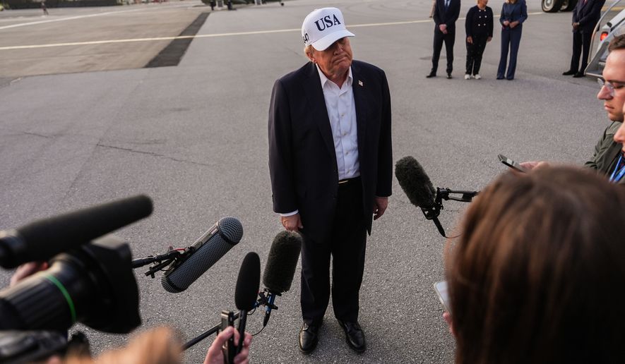 President Donald Trump speaks with reporters before boarding Air Force One at Shannon Airport, Sunday, Sept. 13, 2026, in Shannon, Ireland. (AP Photo/Julia Demaree Nikhinson)