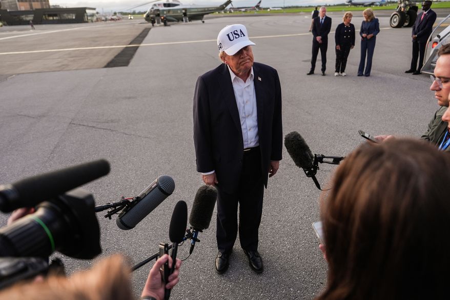 President Donald Trump speaks with reporters before boarding Air Force One at Shannon Airport, Sunday, Sept. 13, 2026, in Shannon, Ireland. (AP Photo/Julia Demaree Nikhinson)