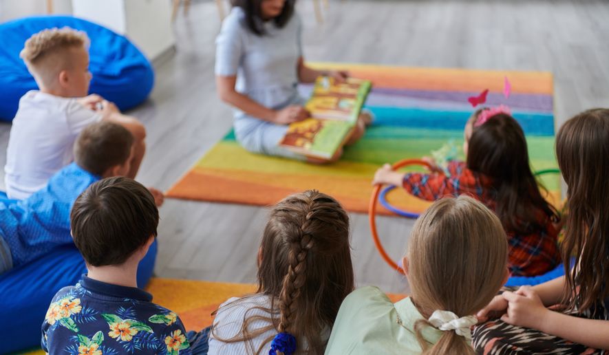 Reading time in an elementary school classroom. File photo credit: dotshock via Shutterstock.