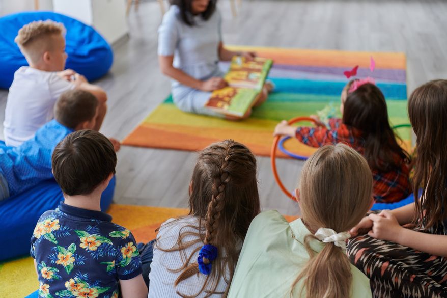 Reading time in an elementary school classroom. File photo credit: dotshock via Shutterstock.
