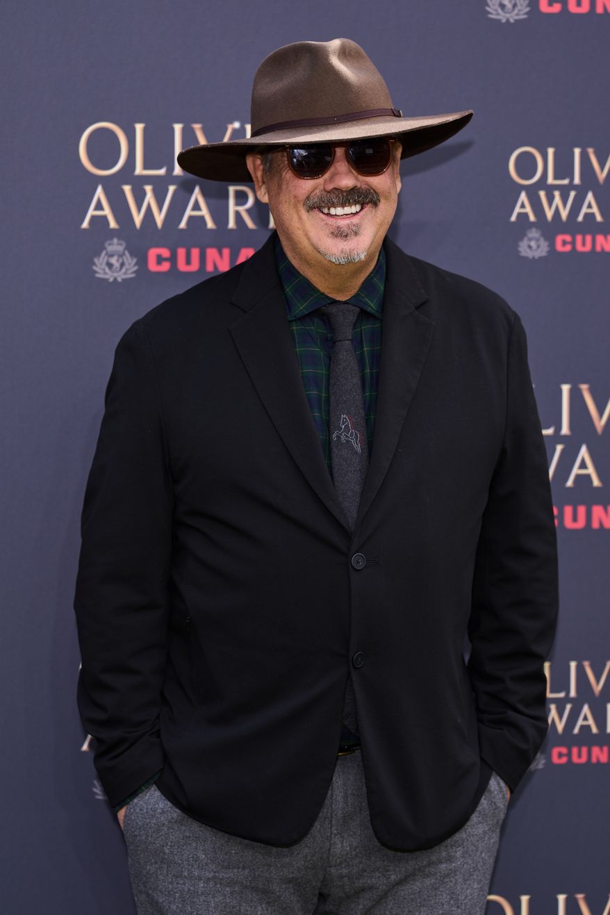 Duncan Sheik poses for photographers upon arrival at the Olivier Awards in London, England, Sunday, April 12, 2026. (Photo by Scott A Garfitt/Invision/AP)