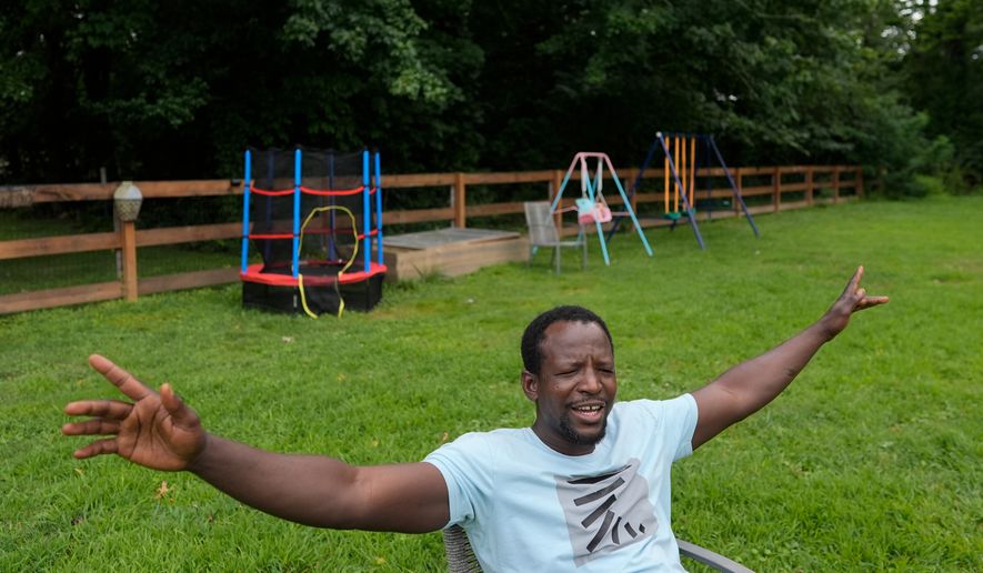 Khalidou Sy, a Mauritanian immigrant, talks in the backyard of his family's home in Lockland, Ohio, Friday, July 31, 2026. (AP Photo/Carolyn Kaster)