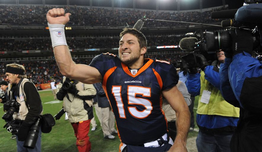 Denver Broncos quarterback Tim Tebow (15) celebrates after beating the Pittsburgh Steelers 29-23 in overtime of an NFL wild card playoff football game Sunday, Jan. 8, 2012, in Denver. (AP Photo/Chris Schneider, File)
