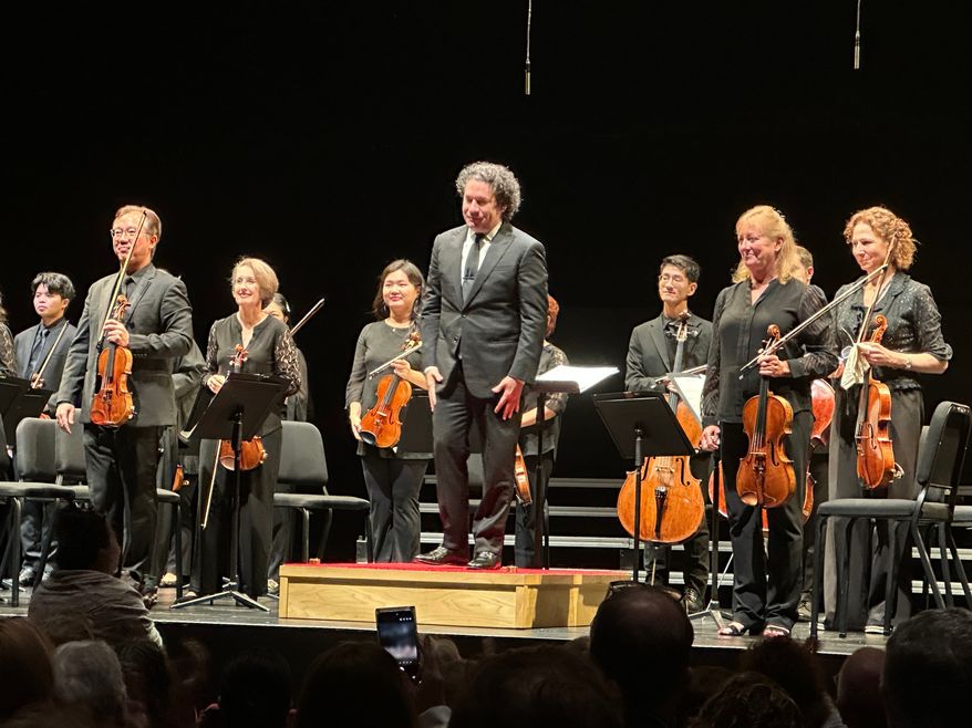 Gustavo Dudamel appears with the New York Philharmonic at a Sounds of Remembrance concert to commemorate the 25th anniversary of the 9/11 attacks at the Perelman Performing Arts Center in New York on Sept. 11, 2026. (AP Photo/Ron Blum)