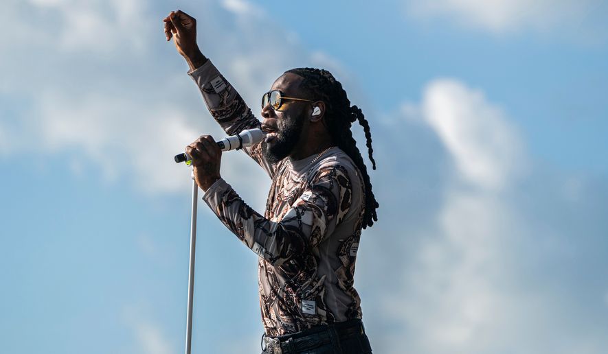 FILE - Burna Boy performs during the first weekend of the New Orleans Jazz & Heritage Festival on April 27, 2025, at Fair Grounds Race Course in New Orleans. (Photo by Amy Harris/Invision/AP, File)
