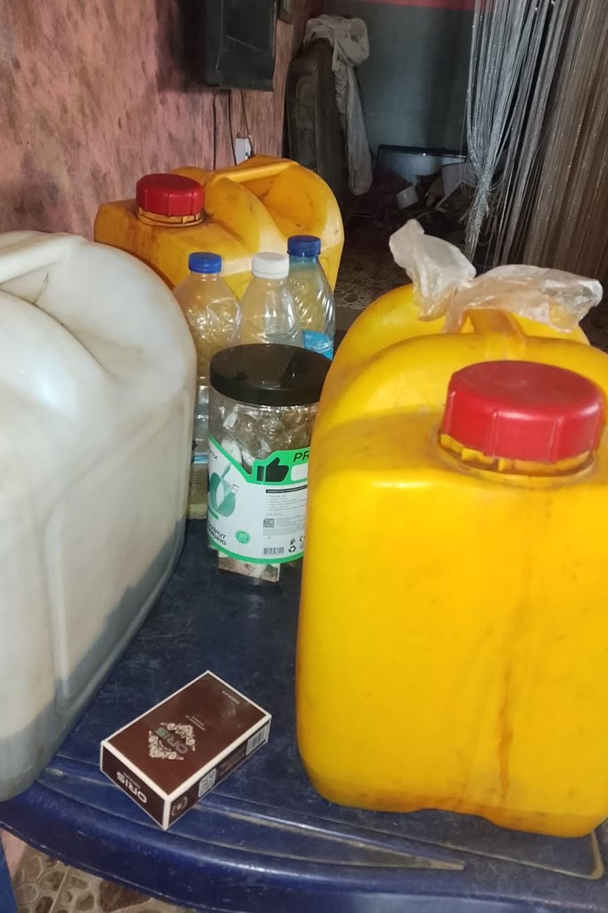 In this photo taken with a smartphone, a locally brewed alcoholic concoction commonly known as ' Monkey Tail' is photographed in Odigbo southern Nigeria, Thursday, Sept. 17, 2026. (AP Photo/Raji Akeem)