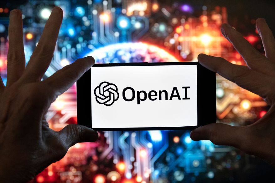 The OpenAI logo is displayed on a cell phone in front of an image generated by ChatGPT's Dall-E text-to-image model, Dec. 8, 2023, in Boston. (AP Photo/Michael Dwyer, File)