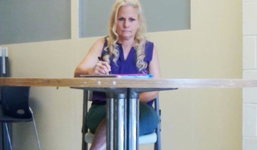 FILE - This image taken from video provided by Merrimack County Superior Court in Concord, N.H., shows Pamela Smart appearing remotely from Bedford Hills Correctional Facility for Women in Bedford Hills, N.Y., during a hearing related to her petition for a new trial, July 20, 2026, in Concord, N.H. (Merrimack County Superior Court via AP, File)