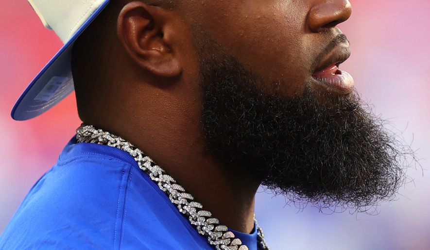 Buffalo Bills defensive lineman Ed Oliver watches warmups before a preseason NFL football game against the Pittsburgh Steelers in Orchard Park, NY., Thursday, Aug. 27, 2026. (AP Photo/Jeffrey T. Barnes)