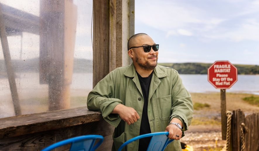 This image released by CNN shows David Chang in a scene from the new CNN travel series, "The Detour with David Chang." (Alanna Hale/CNN via AP)