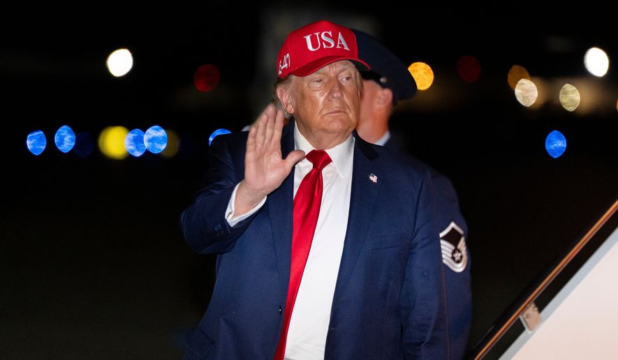 President Donald Trump waves as he arrives on Air Force One, Wednesday, Sept. 16, 2026, at Joint Base Andrews, Md. (AP Photo/Alex Brandon)