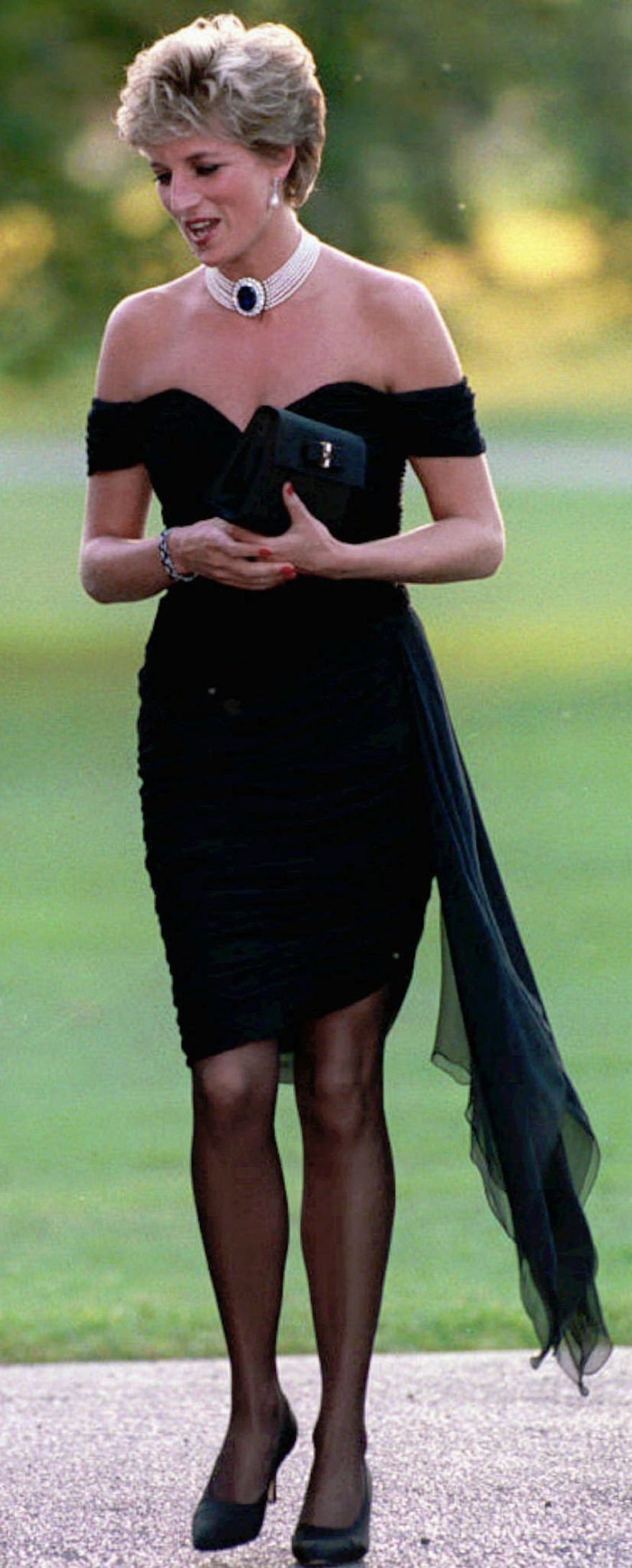FILE - Britain's Diana, Princess of Wales walks during a party given at the Serpentine Gallery in London, 1994. (AP Photo,File)