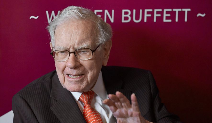 Warren Buffett, chairman and CEO of Berkshire Hathaway, speaks during a game of bridge following the annual Berkshire Hathaway shareholders meeting on May 5, 2019, in Omaha, Neb. (AP Photo/Nati Harnik, File)