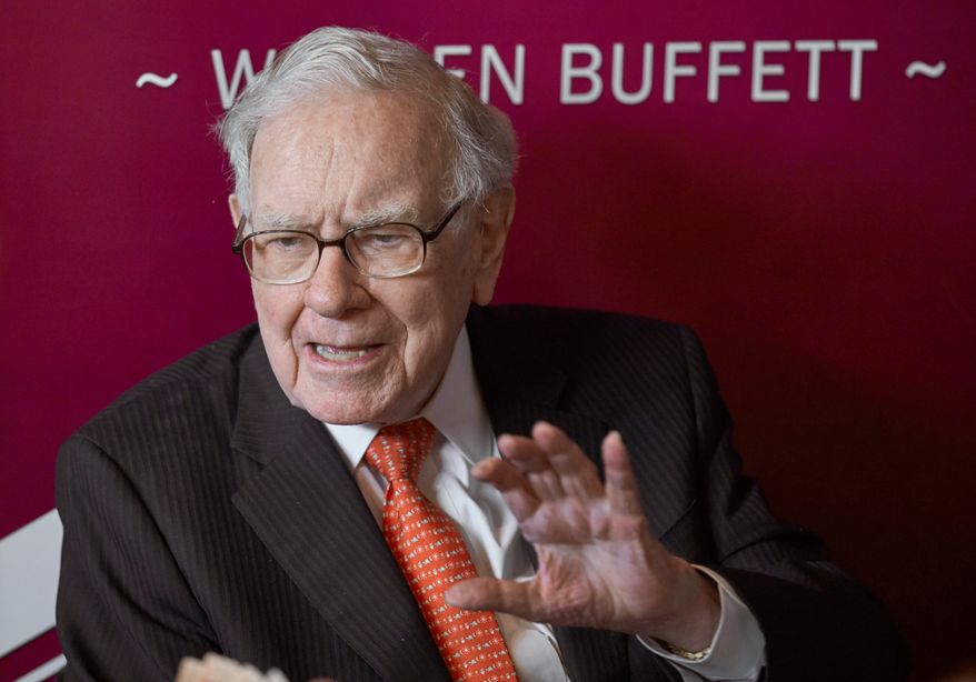 Warren Buffett, chairman and CEO of Berkshire Hathaway, speaks during a game of bridge following the annual Berkshire Hathaway shareholders meeting on May 5, 2019, in Omaha, Neb. (AP Photo/Nati Harnik, File)