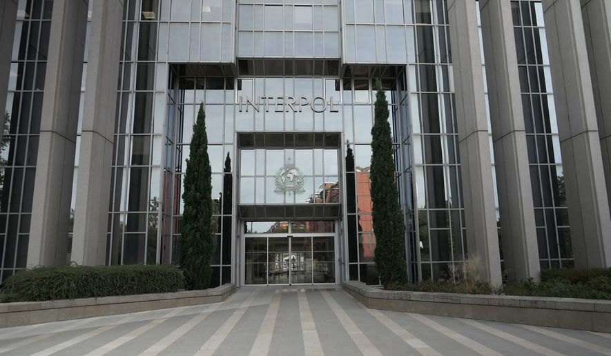 A view of the entrance of the international police agency headquarters in Lyon, France, Thursday, Sept. 17, 2026. (AP Photo/John Leicester) CORRECTION: Date corrected to Thursday Sept. 17, instead of Friday, Sept. 18