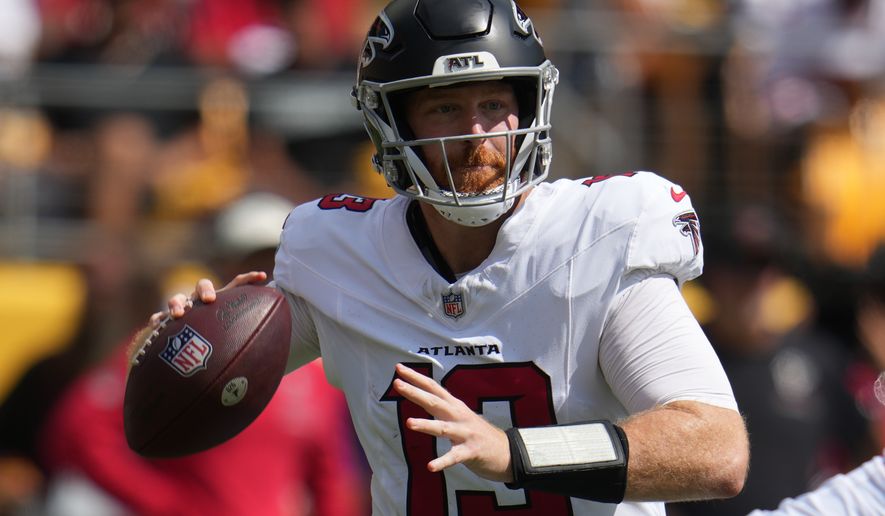 Atlanta Falcons quarterback Cooper Rush (13) looks to pass the ball during an NFL football game against the against the Pittsburgh Steelers, Sunday, Sept. 13, 2026, in Pittsburgh. (AP Photo/Gene J. Puskar)