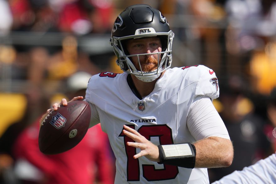 Atlanta Falcons quarterback Cooper Rush (13) looks to pass the ball during an NFL football game against the against the Pittsburgh Steelers, Sunday, Sept. 13, 2026, in Pittsburgh. (AP Photo/Gene J. Puskar)