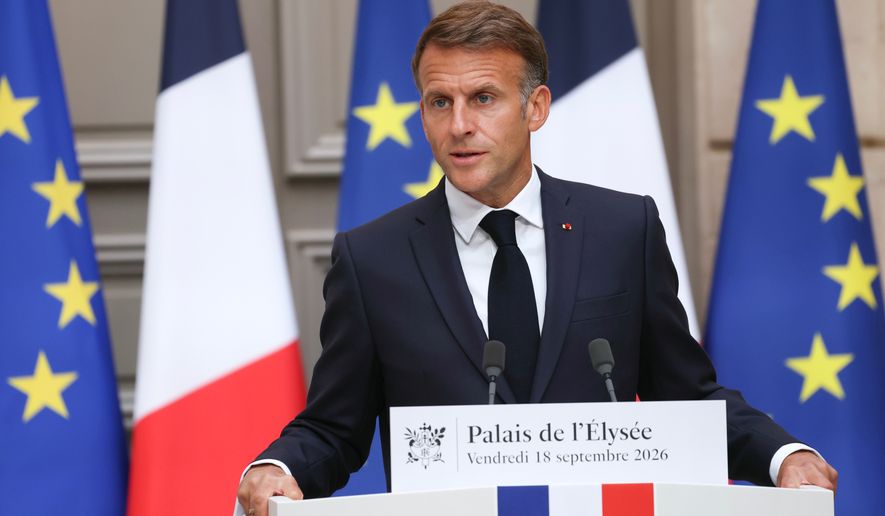 French President Emmanuel Macron gestures as he addresses the audience during a press conference following a meeting with the 2027 presidential election candidates and party leaders focused on the geopolitical situation and its consequences, at the presidential Elysee Palace in Paris, Friday, Sept. 18, 2026. (Thomas Samson/Pool Photo via AP)