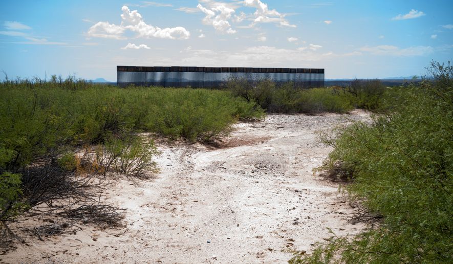 This photo provided by Scott McWilliams shows the first sections of a new border wall being installed in the Big Bend region of west Texas, on Sept. 16, 2026. (Scott McWilliams via AP)