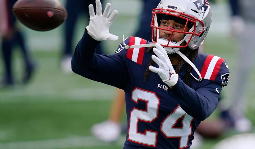 FILE - New England Patriots cornerback Stephon Gilmore warms up before an NFL football game against the San Francisco 49ers in Foxborough, Mass., Oct. 25, 2020. (AP Photo/Charles Krupa, File)