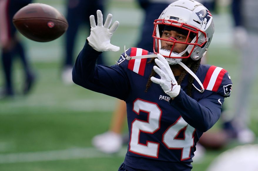 FILE - New England Patriots cornerback Stephon Gilmore warms up before an NFL football game against the San Francisco 49ers in Foxborough, Mass., Oct. 25, 2020. (AP Photo/Charles Krupa, File)