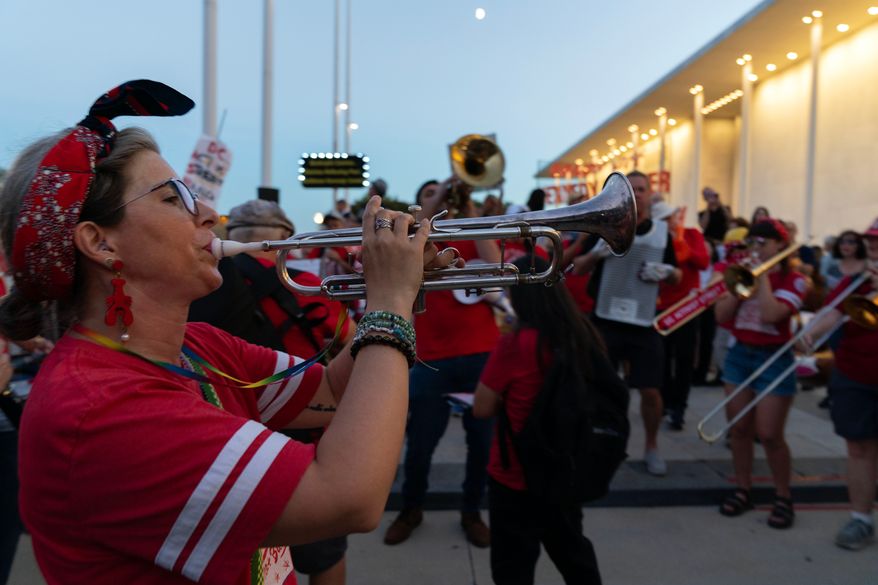 Musicians perform during the rally against the closing of the John F. Kennedy Center for the Performing Arts on Friday, Sept. 18, 2026, in Washington. ( (AP Photo/Jose Luis Magana)