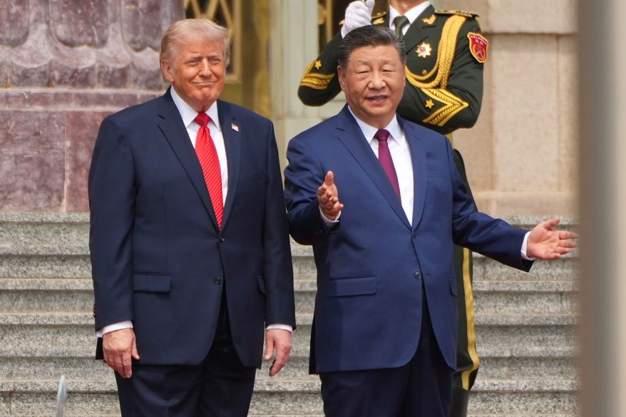 President Donald Trump, left, participates in a welcome ceremony with China's President Xi Jinping at the Great Hall of the People, May 14, 2026, in Beijing. (AP Photo/Mark Schiefelbein, File)