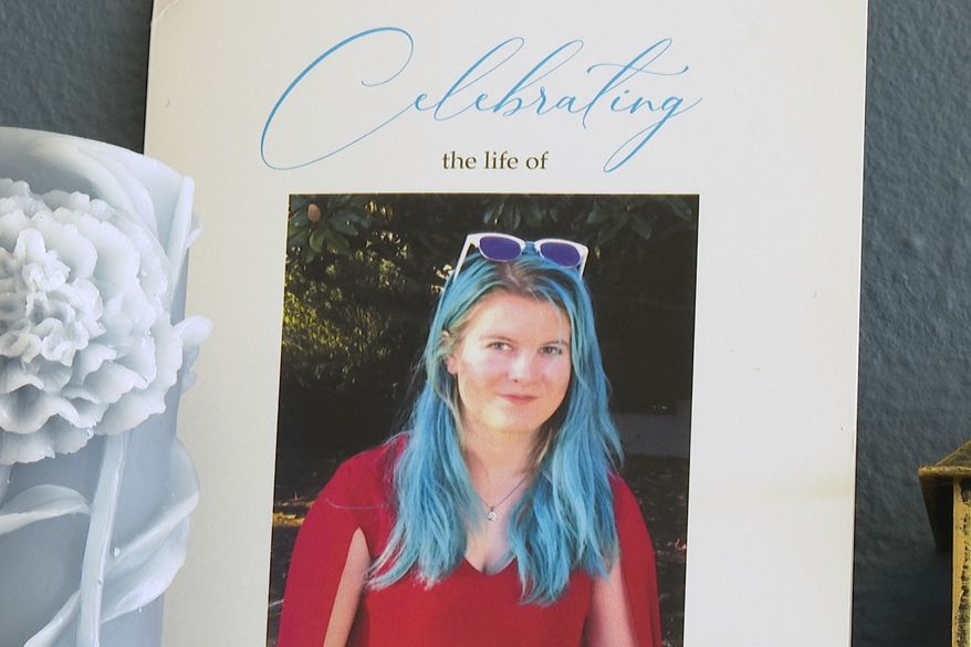 This image from video shows a photo of Emily Normandin-Parker on her memorial program at her parents' home in Seattle, Friday, Sept. 18, 2026. (AP Photo/Manuel Valdes)