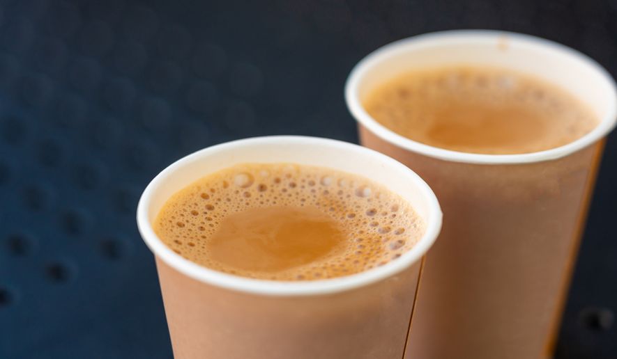 While the global appetite for tea continues to rise, chai keeps attracting new audiences. Masala chai, spiced milk tea in paper cup, traditional cardamom hot drink with spices. File photo credit: Ermak Oksana via Shutterstock.