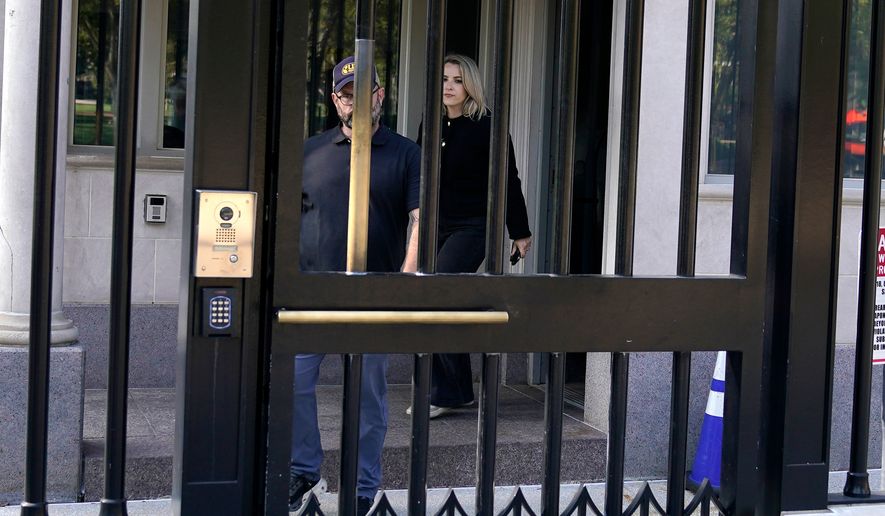 CNN Senior White House Reporter Betsy Klein, right, departs after having her credential revoked following President Donald Trump's ban on CNN, MS NOW and Politico, at the White House, Saturday, Sept. 19, 2026, in Washington. (AP Photo/Jose Luis Magana)