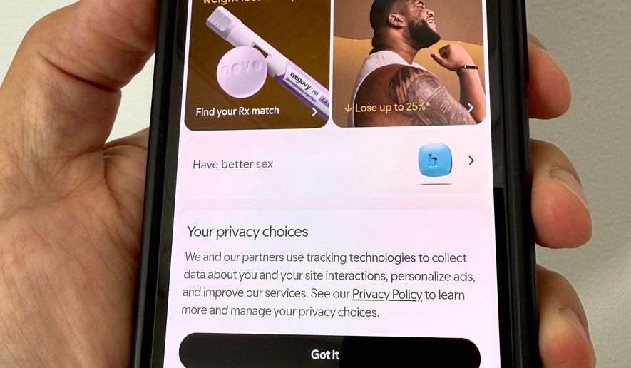 The Hims website is displayed on a smartphone in Philadelphia on Wednesday, Sept. 16, 2026. (AP Photo/Jonathan Poet)