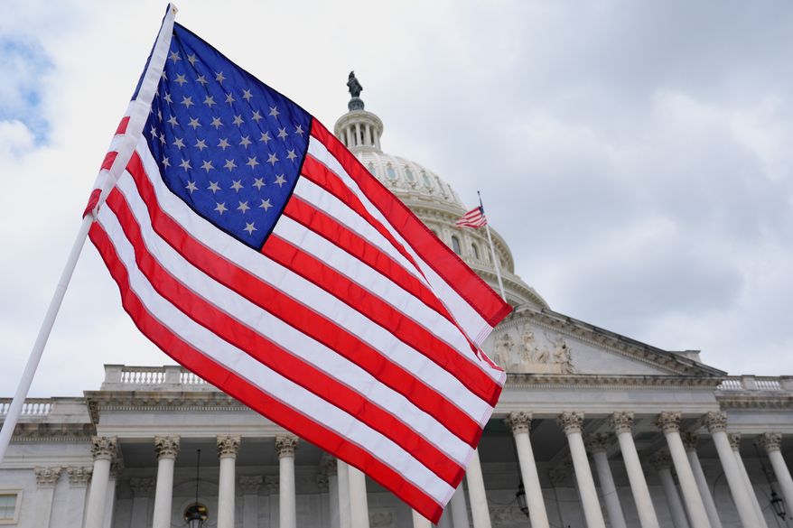 The U.S. flag flies in font of the Capitol, on June 8, 2026, in Washington. (AP Photo/Mariam Zuhaib, File)