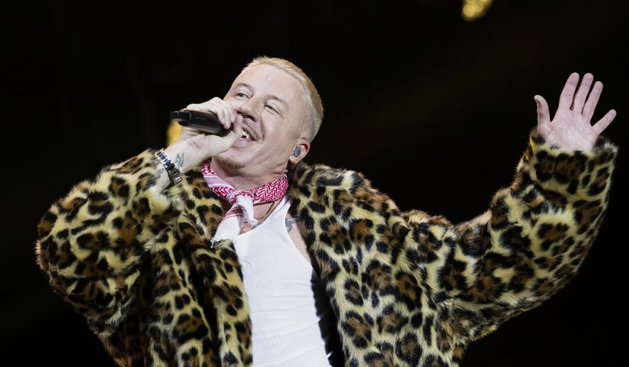 U.S. rapper Macklemore performs on the Main Stage at the 42th Gurtenfestival edition in Bern, Switzerland, Wednesday, July 16, 2025. (Anthony Anex/Keystone via AP, File)