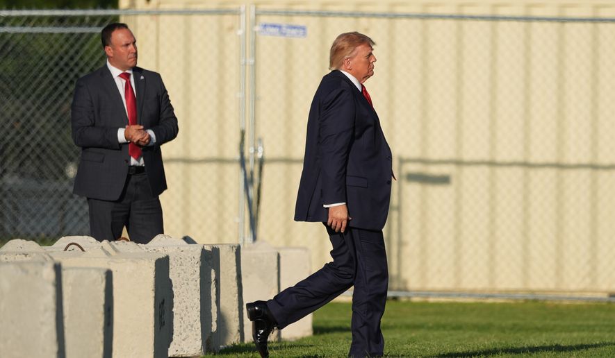 President Donald Trump walks to board Marine One on the Ellipse near the White House, Friday, Sept. 18, 2026, in Washington. (AP Photo/Alex Brandon)