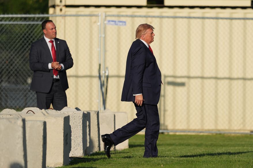 President Donald Trump walks to board Marine One on the Ellipse near the White House, Friday, Sept. 18, 2026, in Washington. (AP Photo/Alex Brandon)