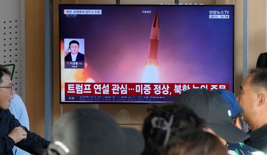 A TV screen shows a file image of a North Korean missile launch during a news program at Seoul Railway Station in Seoul, South Korea, Sunday, Sept. 20, 2026. (AP Photo/Ahn Young-joon)