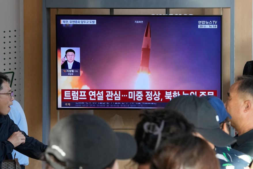 A TV screen shows a file image of a North Korean missile launch during a news program at Seoul Railway Station in Seoul, South Korea, Sunday, Sept. 20, 2026. (AP Photo/Ahn Young-joon)