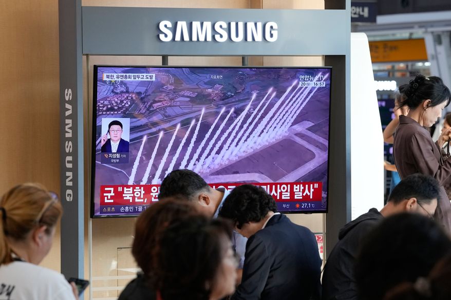 A TV screen shows a file image of a North Korean missile launch during a news program at Seoul Railway Station in Seoul, South Korea, Sunday, Sept. 20, 2026. (AP Photo/Ahn Young-joon)