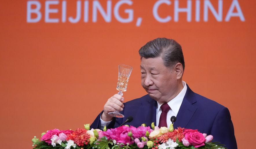 Chinese President Xi Jinping proposes a toast during a state dinner with President Donald Trump at the Great Hall of the People in Beijing on May 14, 2026. (AP Photo/Mark Schiefelbein) **FILE**