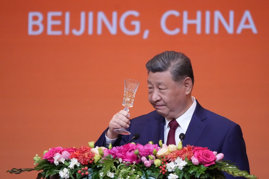 Chinese President Xi Jinping proposes a toast during a state dinner with President Donald Trump at the Great Hall of the People in Beijing on May 14, 2026. (AP Photo/Mark Schiefelbein) **FILE**
