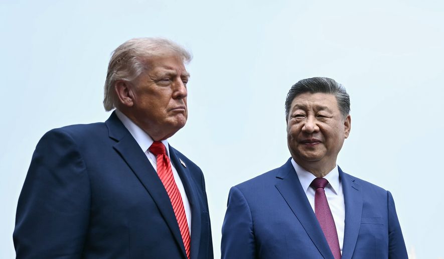 China's President Xi Jinping, right, and U.S. President Donald Trump visit the Temple of Heaven in Beijing, May 14, 2026. (Brendan Smialowski/Pool Photo via AP, File)