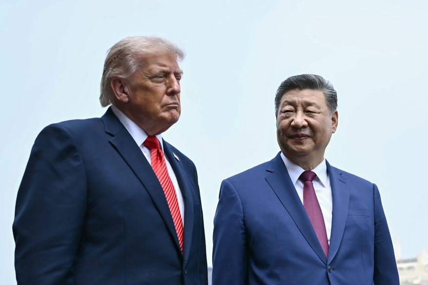 China's President Xi Jinping, right, and U.S. President Donald Trump visit the Temple of Heaven in Beijing, May 14, 2026. (Brendan Smialowski/Pool Photo via AP, File)